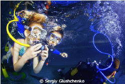 Children diving. by Sergiy Glushchenko 